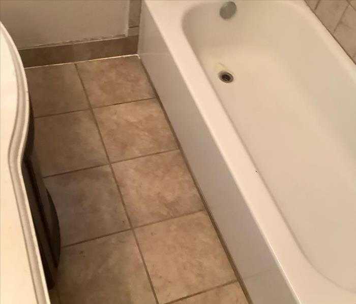 After tiles and bath tub put back in restroom