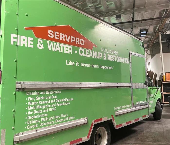 Green Servpro truck with Alhambra decals